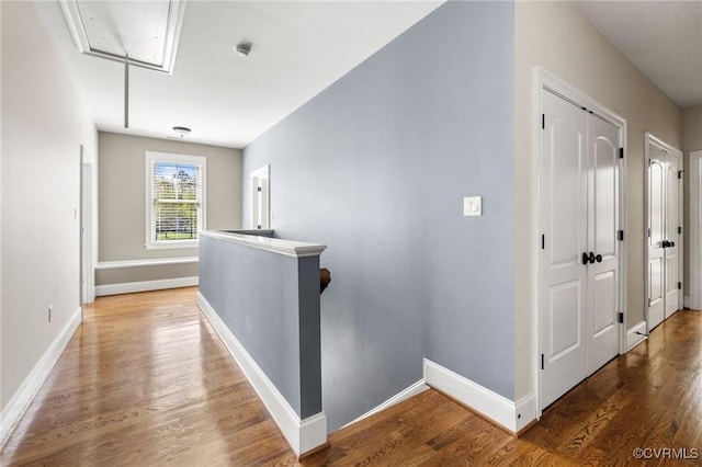 1300 Baltrey Ln, Midlothian, VA 23112 - hall with attic access, wood finished floors, baseboards, and an upstairs landing