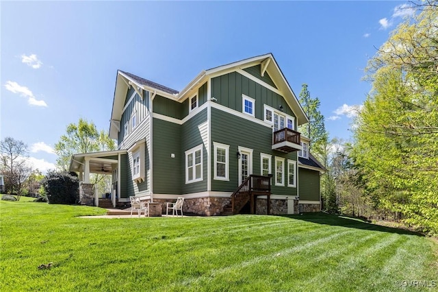 1300 Baltrey Ln, Midlothian, VA 23112 - view of home's exterior featuring board and batten siding, a lawn, and a balcony
