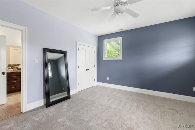 1300 Baltrey Ln, Midlothian, VA 23112 - unfurnished bedroom featuring carpet floors, baseboards, a closet, and a ceiling fan