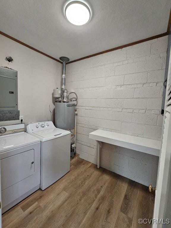 3109 Comet Rd, Richmond, VA 23294 - laundry room featuring crown molding, laundry area, wood finished floors, washing machine and clothes dryer, and water heater