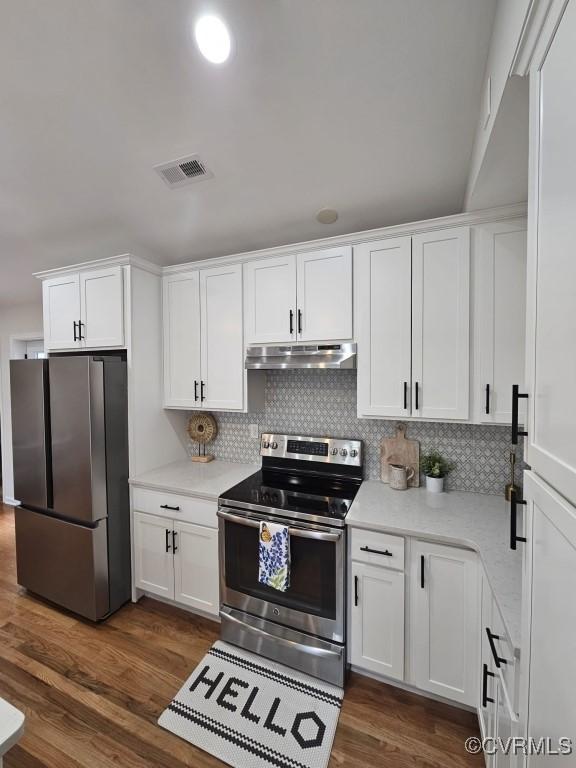 3109 Comet Rd, Richmond, VA 23294 - kitchen featuring visible vents, light countertops, under cabinet range hood, white cabinets, and stainless steel appliances