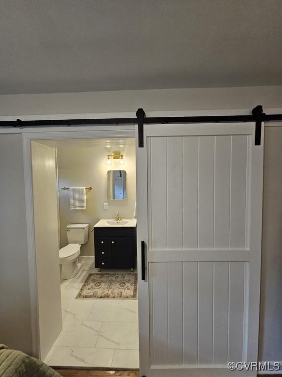 3109 Comet Rd, Richmond, VA 23294 - half bathroom featuring vanity, toilet, and marble finish floor