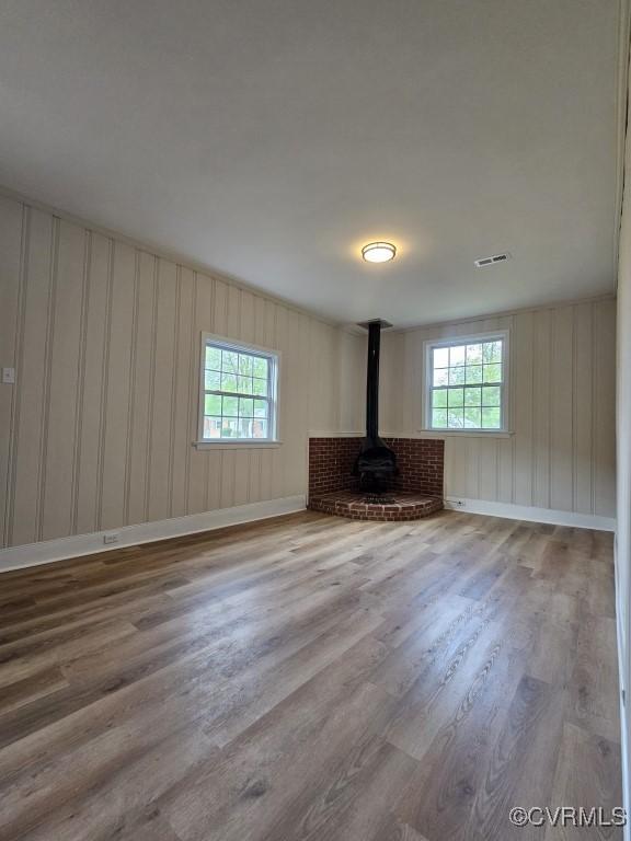 3109 Comet Rd, Richmond, VA 23294 - unfurnished living room featuring baseboards, visible vents, and wood finished floors