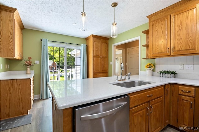 106 Kennon Pointe Ct, Colonial Heights, VA 23834 - kitchen with stainless steel dishwasher, a sink, brown cabinetry, open shelves, and wood finished floors