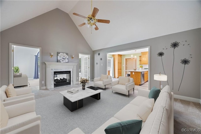 106 Kennon Pointe Ct, Colonial Heights, VA 23834 - living room featuring high vaulted ceiling, light carpet, a high end fireplace, and ceiling fan