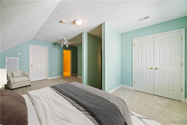 106 Kennon Pointe Ct, Colonial Heights, VA 23834 - carpeted bedroom featuring a textured ceiling, baseboards, a closet, and lofted ceiling