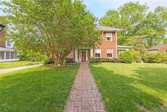 1731 Westover Ave, Petersburg, VA 23805 - view of front of property featuring a front lawn and brick siding