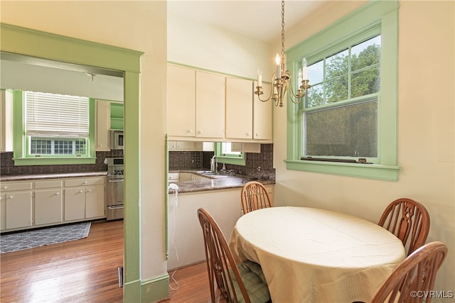 1731 Westover Ave, Petersburg, VA 23805 - dining room with a chandelier and wood finished floors