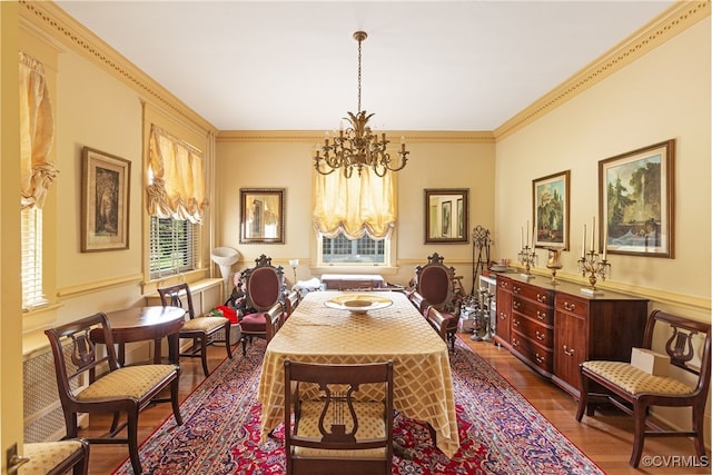 1731 Westover Ave, Petersburg, VA 23805 - dining space featuring a chandelier, healthy amount of natural light, dark wood-type flooring, and crown molding