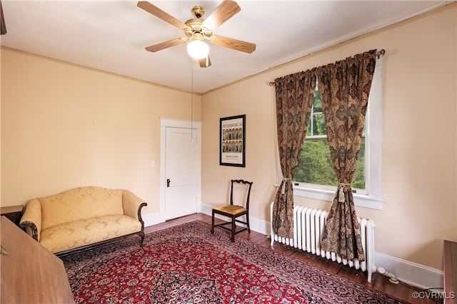1731 Westover Ave, Petersburg, VA 23805 - sitting room featuring radiator heating unit, wood finished floors, ceiling fan, and baseboards