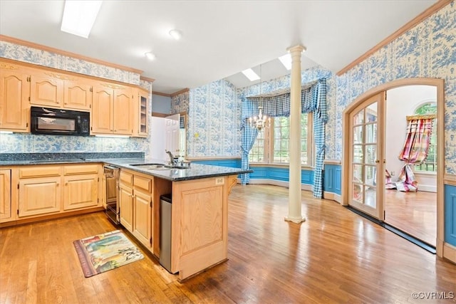 419 Dellbrooks Pl, Henrico, VA 23238 - kitchen with wallpapered walls, ornate columns, black appliances, light brown cabinetry, and light wood-style flooring