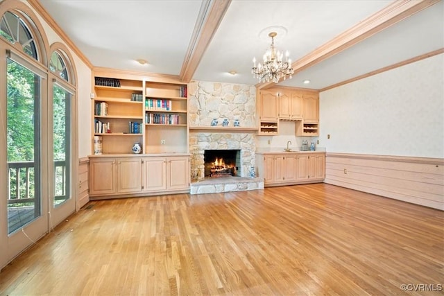419 Dellbrooks Pl, Henrico, VA 23238 - unfurnished living room with crown molding, light wood-type flooring, a chandelier, plenty of natural light, and a sink