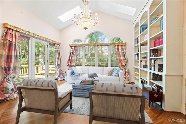 419 Dellbrooks Pl, Henrico, VA 23238 - sitting room with a skylight, a chandelier, vaulted ceiling, and wood finished floors