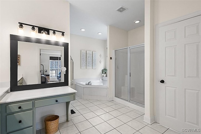 bathroom featuring recessed lighting, tile patterned flooring, a shower stall, a bath, and visible vents