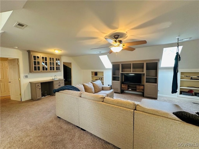 13325 Shore Lake Turn, Chesterfield, VA 23838 - living room with a ceiling fan, light colored carpet, a skylight, and built in shelves