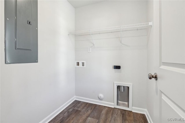 laundry room with electric panel, dark wood-style floors, hookup for a washing machine, gas dryer hookup, and laundry area