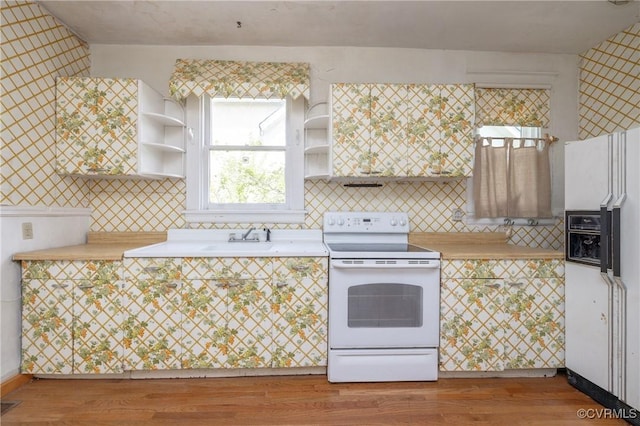 3220 Cliff Ave, Richmond, VA 23222 - kitchen featuring white appliances, open shelves, and light countertops