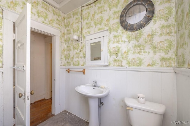 3220 Cliff Ave, Richmond, VA 23222 - half bath featuring a wainscoted wall, wallpapered walls, toilet, a sink, and wood finished floors