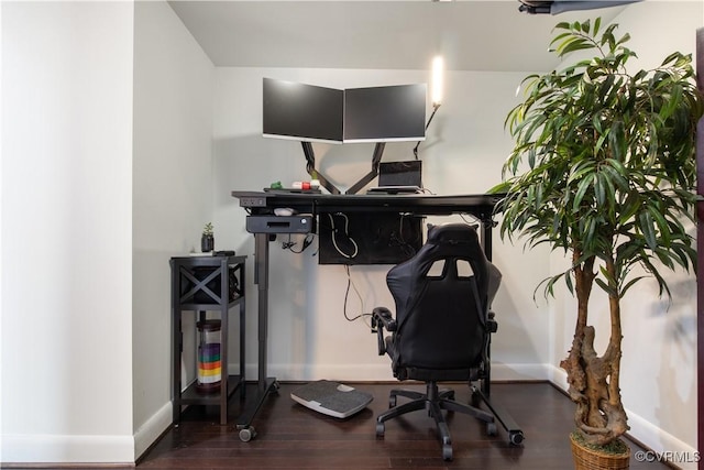 office with wood finished floors and baseboards