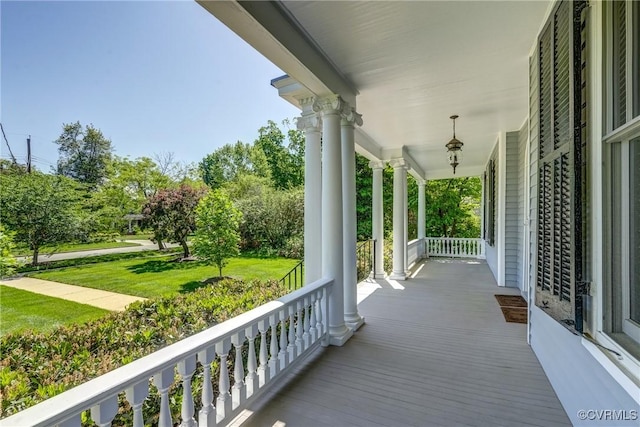 wooden deck featuring covered porch