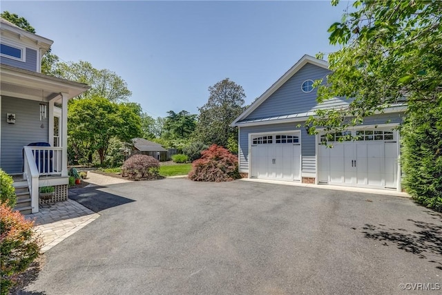 garage with covered porch