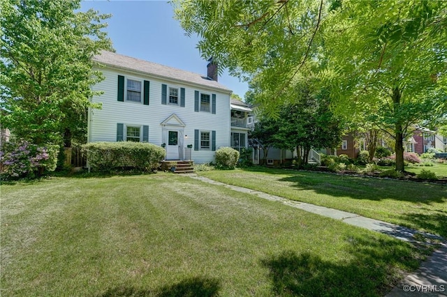 4821 W Seminary Ave, Richmond, VA 23227 - colonial house with a chimney and a front yard