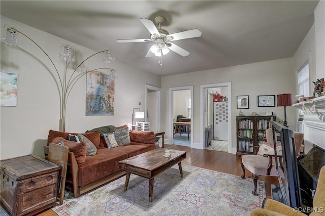 4821 W Seminary Ave, Richmond, VA 23227 - living area with ceiling fan, wood finished floors, and baseboards