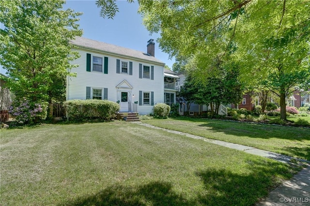 4821 W Seminary Ave, Richmond, VA 23227 - colonial-style house with a chimney and a front yard
