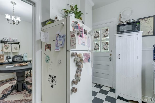 4821 W Seminary Ave, Richmond, VA 23227 - mudroom featuring tile patterned floors and a chandelier