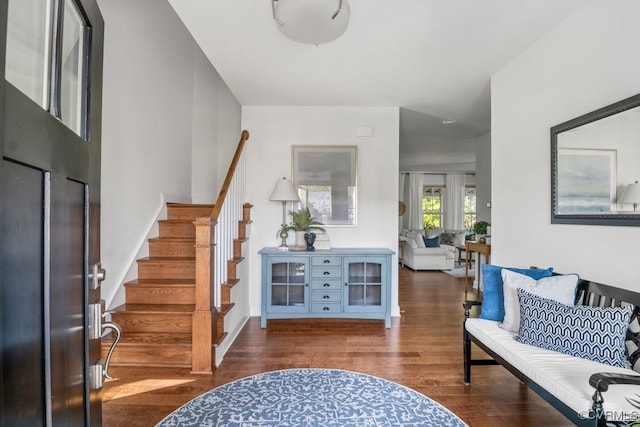 entrance foyer featuring wood finished floors and stairway