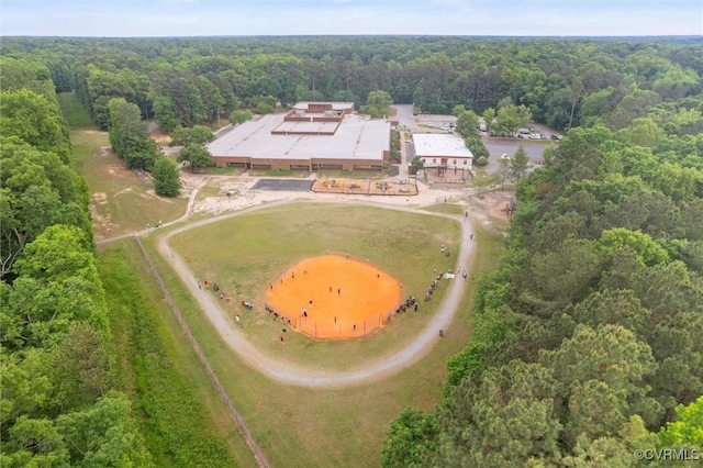 aerial overview of property's location featuring a forest