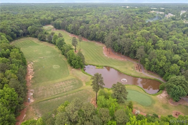 aerial overview of property's location with a nearby body of water, a heavily wooded area, and a golf club