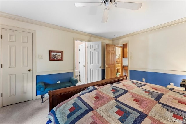 bedroom featuring carpet, ornamental molding, and ceiling fan