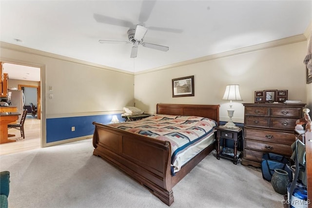 bedroom with ornamental molding, light colored carpet, a ceiling fan, and baseboards