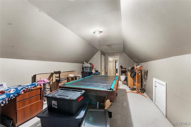 rec room with carpet floors and lofted ceiling