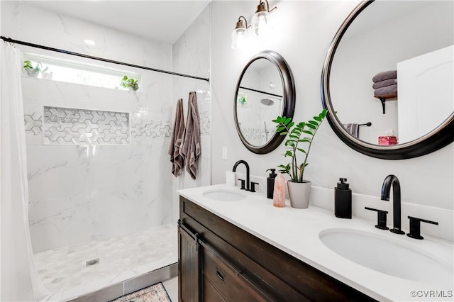 bathroom featuring double vanity, a sink, and a shower with shower curtain