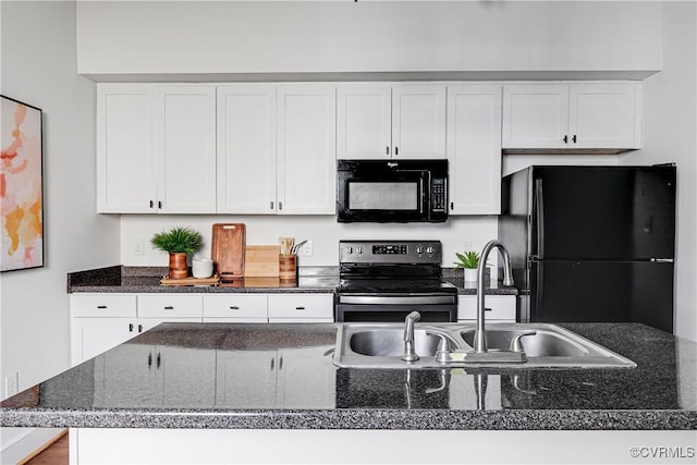 kitchen featuring white cabinets, a sink, and black appliances