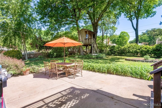 view of patio / terrace with outdoor dining area and a fenced backyard