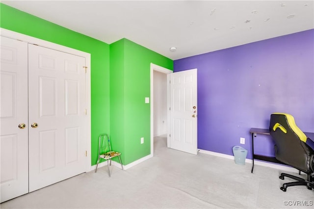 unfurnished office with carpet floors and baseboards
