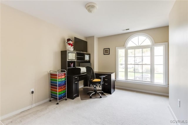 home office featuring baseboards, carpet, and visible vents