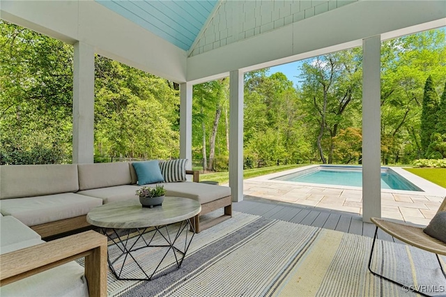 exterior space featuring a swimming pool