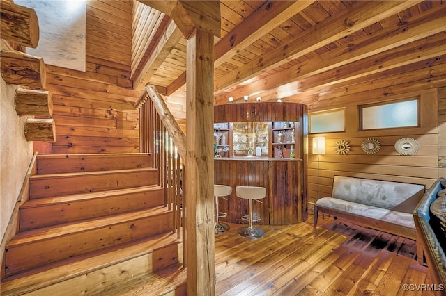 2793 Huguenot Springs Rd, Powhatan, VA 23113 - staircase with beam ceiling, wood walls, wood ceiling, and hardwood / wood-style flooring