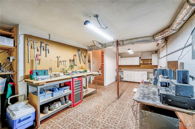 2793 Huguenot Springs Rd, Powhatan, VA 23113 - interior space featuring a workshop area and a textured ceiling