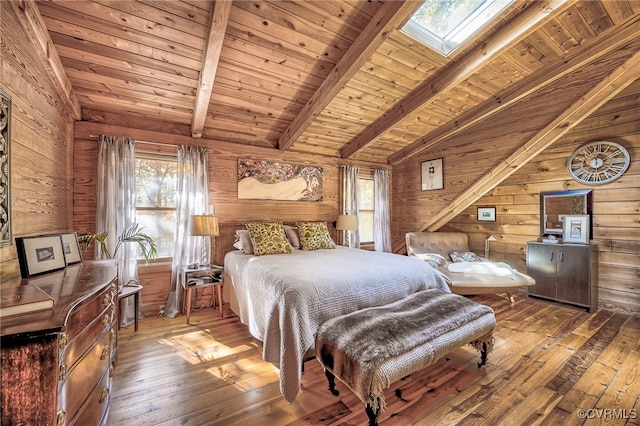 2793 Huguenot Springs Rd, Powhatan, VA 23113 - bedroom with vaulted ceiling with skylight, hardwood / wood-style flooring, wood walls, and wooden ceiling