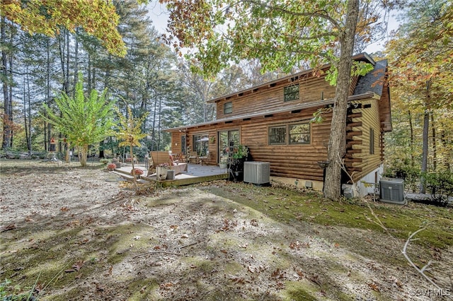 2793 Huguenot Springs Rd, Powhatan, VA 23113 - rear view of property featuring crawl space, french doors, a deck, central AC unit, and log siding