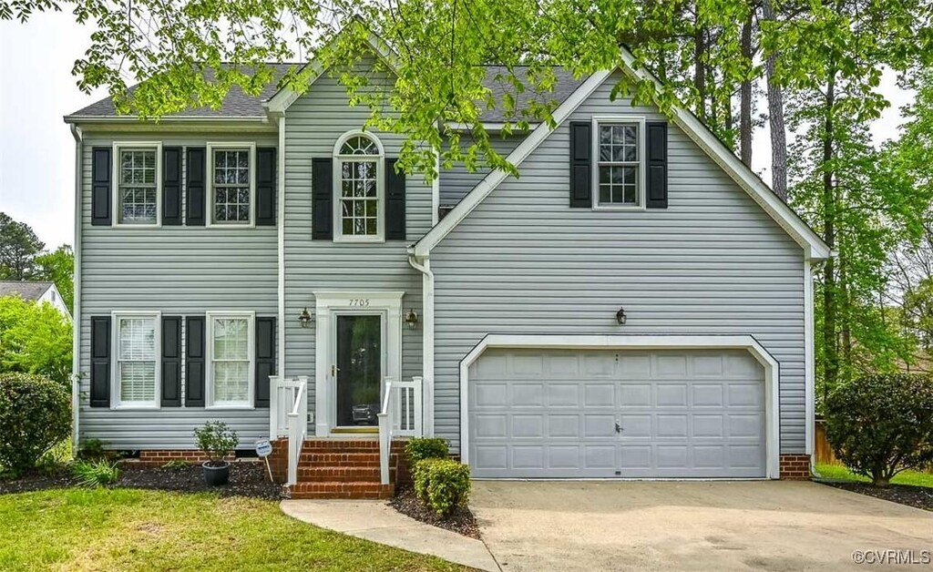 7705 Hungary Woods Pl, Glen Allen, VA 23060 - view of front of house featuring driveway and a garage