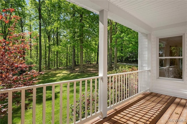 deck featuring a yard