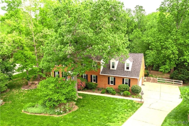 12911 Chipstead Rd, Chester, VA 23831 - cape cod house with brick siding, roof with shingles, and driveway