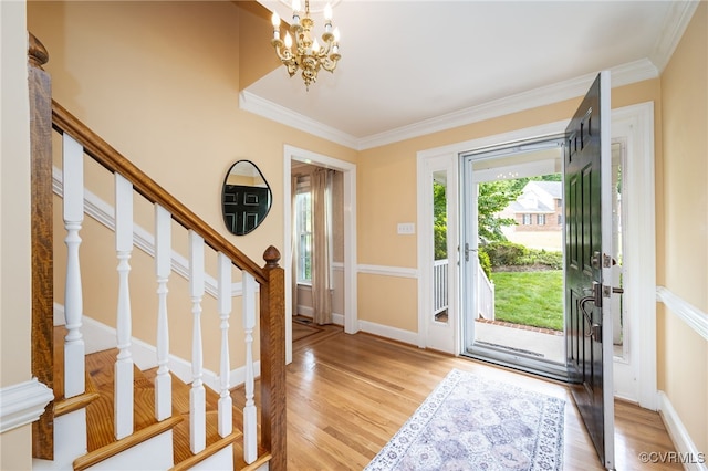 12911 Chipstead Rd, Chester, VA 23831 - foyer entrance featuring stairs, crown molding, light wood finished floors, a chandelier, and baseboards