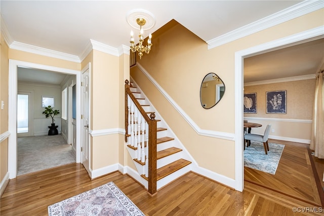 12911 Chipstead Rd, Chester, VA 23831 - staircase featuring a chandelier, wood finished floors, crown molding, and baseboards